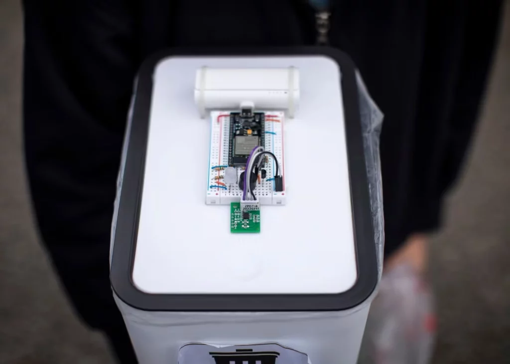 A close-up image of the top of Amy Bach and Sunny Huynh's Bin Genius device, which uses odour sensors and AI to differentiate garbage placed inside (courtesy Ben Nelms/CBC News)