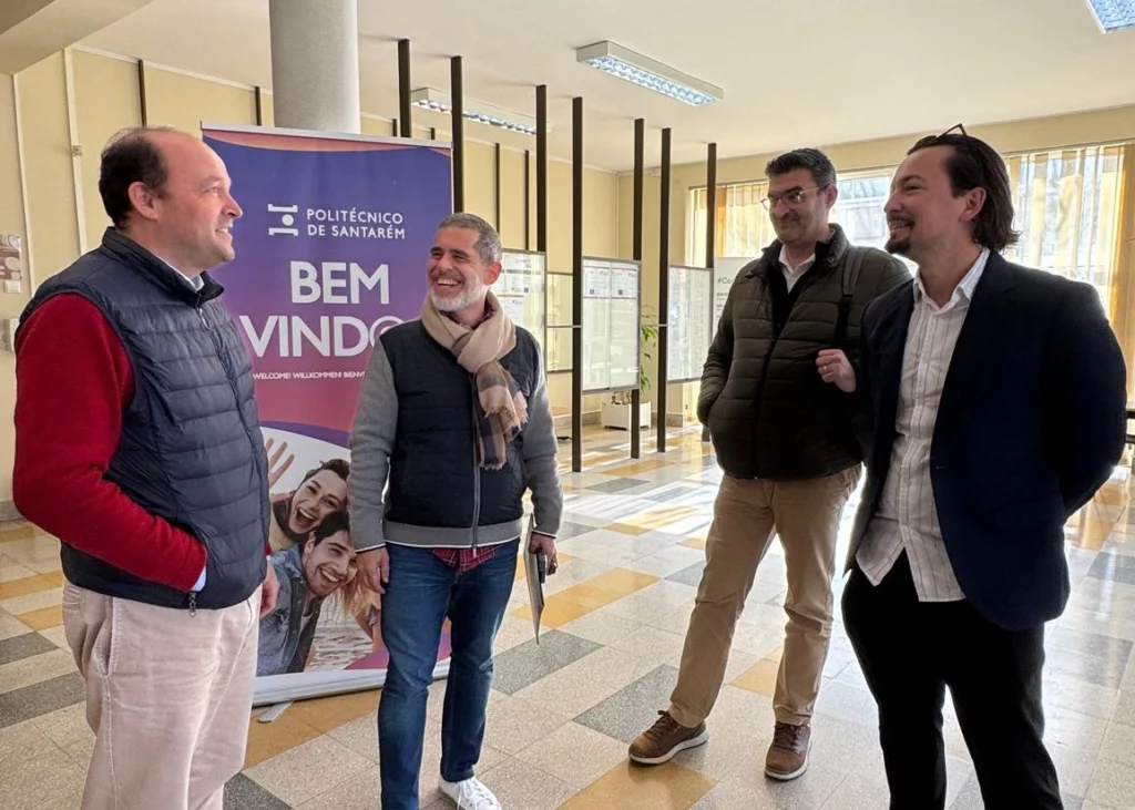 Ryan Gallagher in conversation with colleagues at IP Santarém