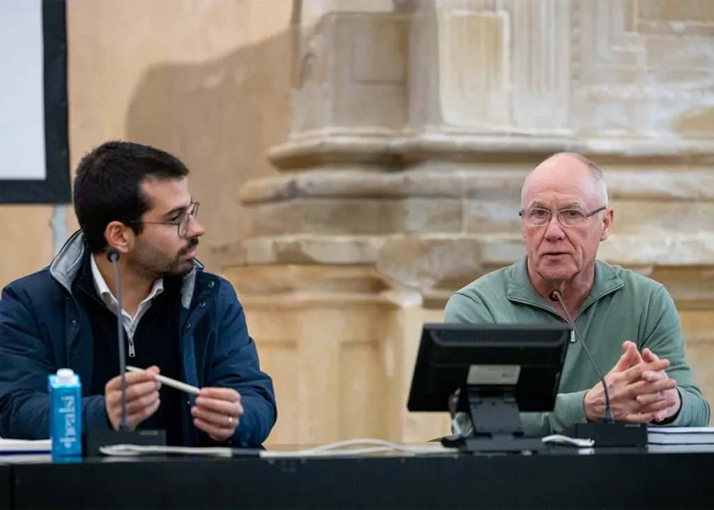 Jim Wayner speaks to cybersecurity concerns with AI evolving as Vasco Lopes looks on