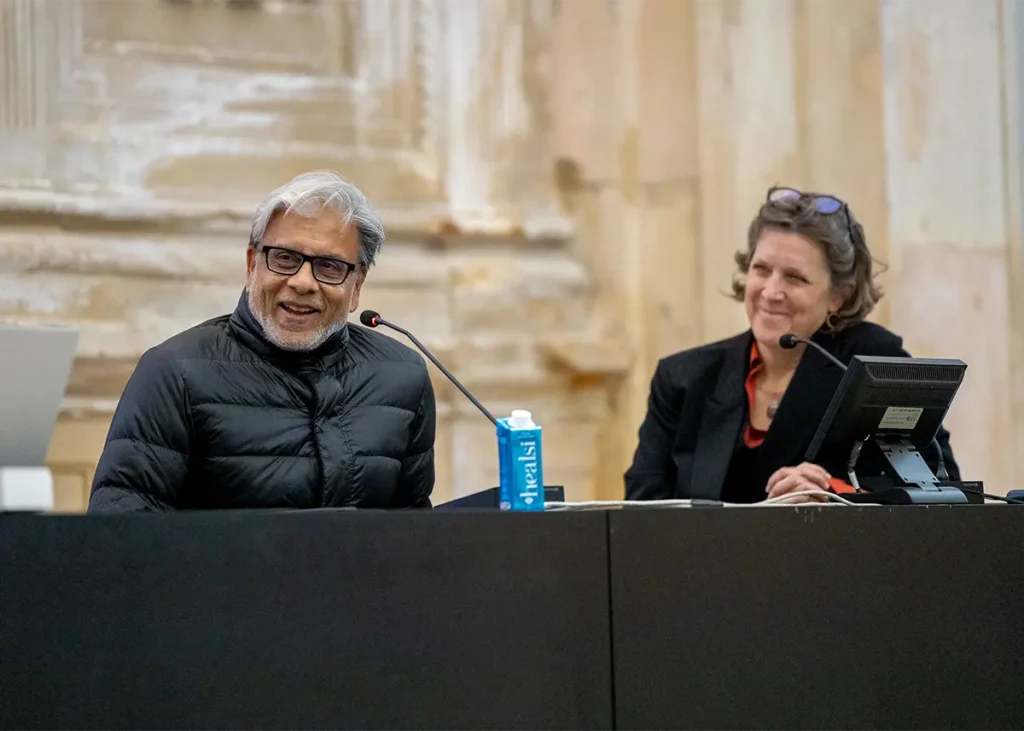 A smiling Abdul Alim and Dr Jessica Boyatt react to a comment 