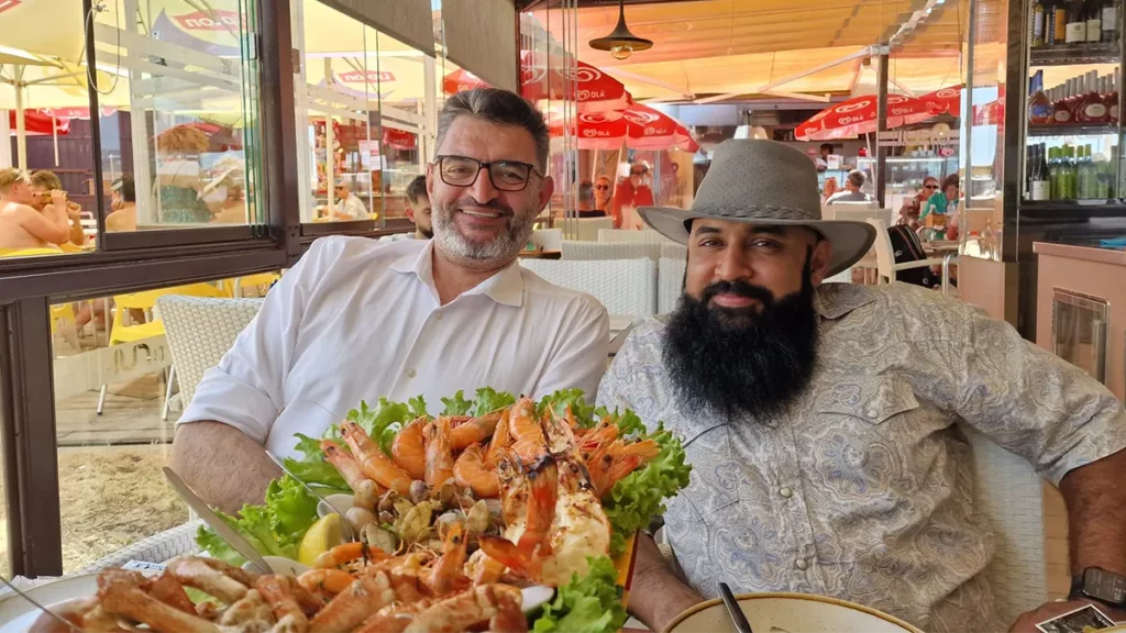 Filipe Galego and Prashant Pawar enjoying a lunch together in Faro